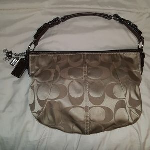 Gold and brown Coach shoulder bag